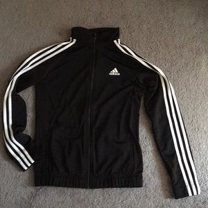 Adidas Tracktop. Black with white stripes.